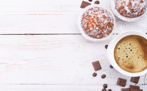 Coffee cup with a cake . Background.