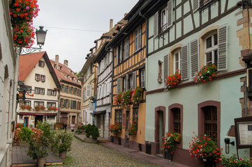 Fototapeta na wymiar beautifully flowered street of the old town