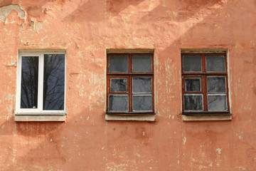 Windows on the wall of an old house