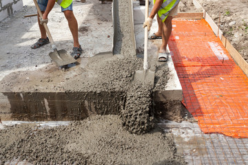 Concrete work, pouring cement mortar into formwork