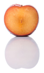 Victoria plum or red plum over white background