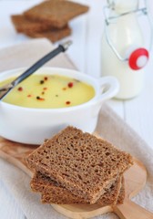 Chicken liver pate on bread and in plate