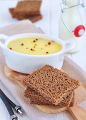 Chicken liver pate on bread and in plate
