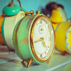 Retro syled image of ancient alarm clocks