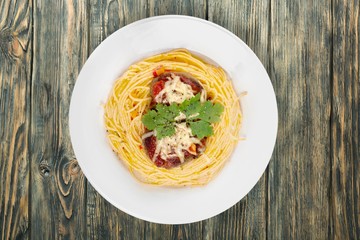 Spaghetti. Spaghetti with tomato sauce and sprinkled with cheese