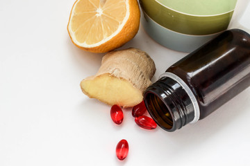 Lemon, ginger and pills for healing
