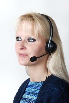 Portrait of young woman with headset