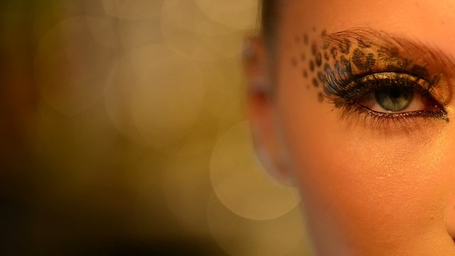 Beauty Girl with Leopard Makeup
