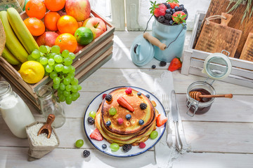 Tasty pancakes with fresh fruits