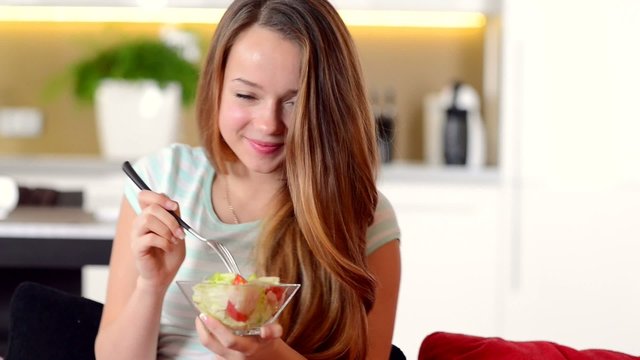 Beautiful Girl Eating Vegetable Salad. Dieting Concept