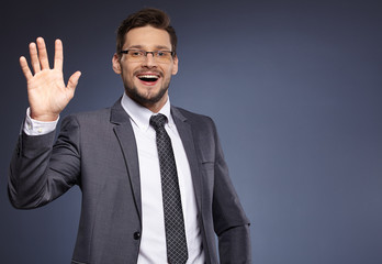 Business, people and office concept -  businessman in suit