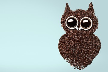 Abstract. Easy way to the nightlife. A funny owl, made of coffee