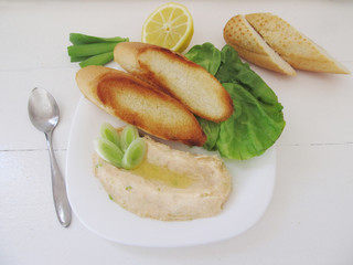 White bean spread with crispy toasts.