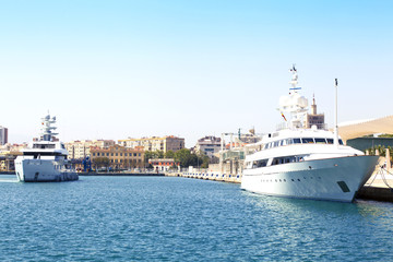 Fototapeta na wymiar Luxury yachts at harbour in Malaga, Spain.