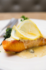Salmon steak with caper lemon sauce mashedpotato and spinach
