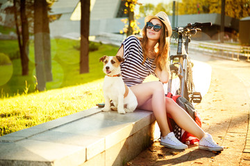 Smiling Hipster Girl with her Dog and Bike - 81987236