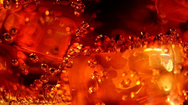 Cola background. Cola with ice and bubbles. Full HD 1080p