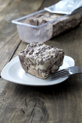 Halva with almonds and raisins on plate