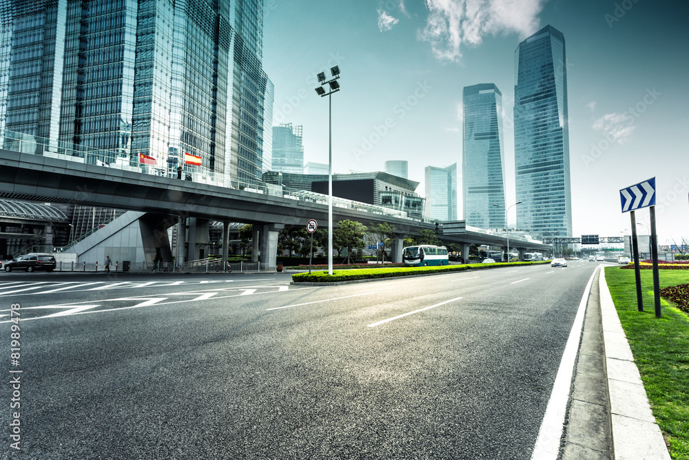 Wall mural urban road and modern city skyline