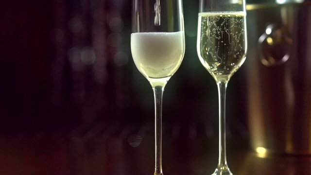 Champagne pouring from the bottle. Slo-mo. Full HD 1080p