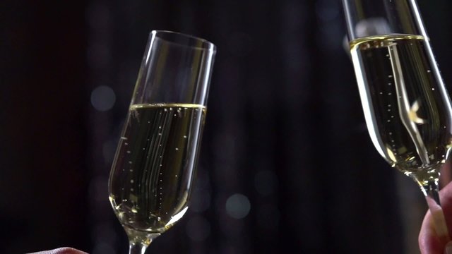 Toasting Champagne. Two Glasses with Sparkling Wine