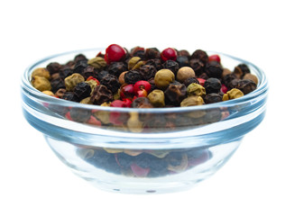 Pepper grains in glass dish