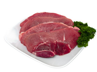Fresh porc cuts global view in plate
