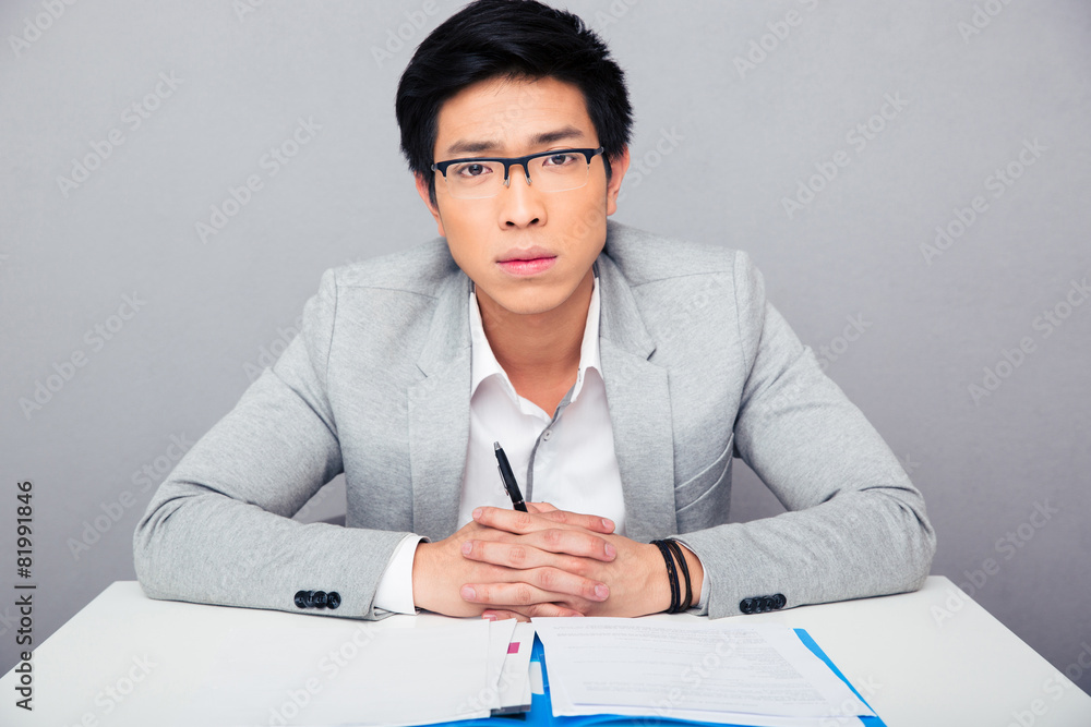 Canvas Prints Handsome asian businessman in glasses 