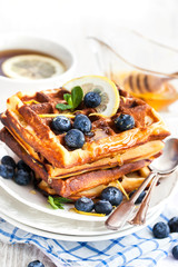 Lemon blueberry waffles with honey