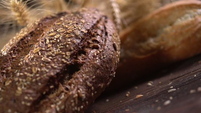 Bakery Bread on a Wooden Table. Dolly shot. Full HD 1080p