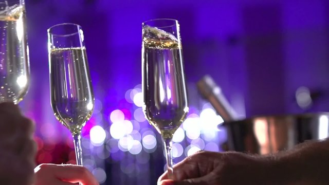 Glasses with Sparkling Champagne over Holiday Background