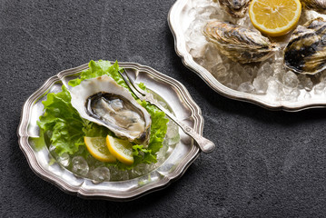 Fresh oyster on plate ready to eat