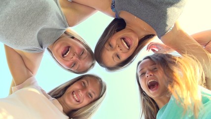 Group of happy teenage friends having fun outdoors