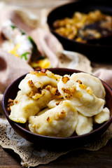 Potatoes vareniki in a ceramic bowl.