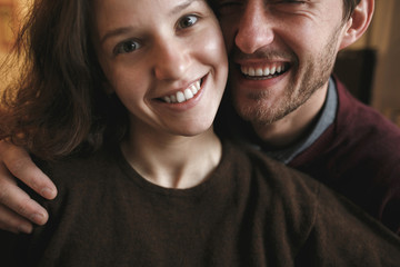 Vintage couple hugs and laughing