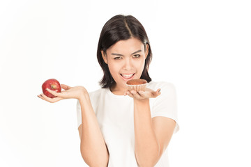 Smiling woman with apple isolated on white