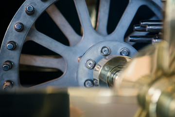 Fototapeta premium Large wheel, detail of clock internal parts