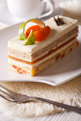 apricot cake close-up on a plate. vertical