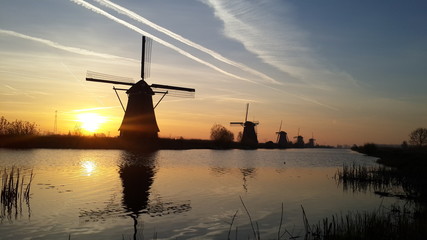 Silhouette windmills in Kinderdijk Netherlands