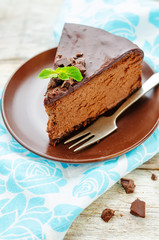 chocolate cheesecake with chocolate glaze