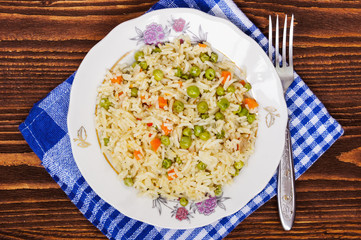 A plate of rice with vegetables, selective focus