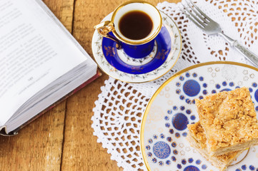 Homemade apple pie and coffee on wooden table
