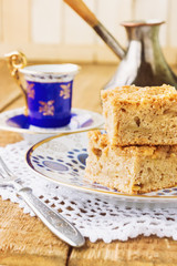 Homemade apple pie and coffee on wooden table
