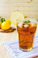 Refreshing ice tea with lemons and mint