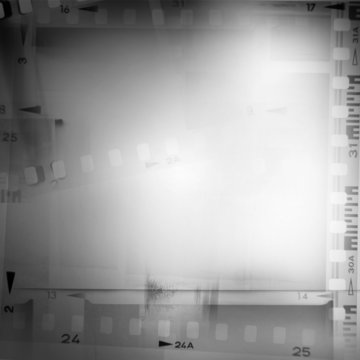 Grey filmstrip film negative frame background