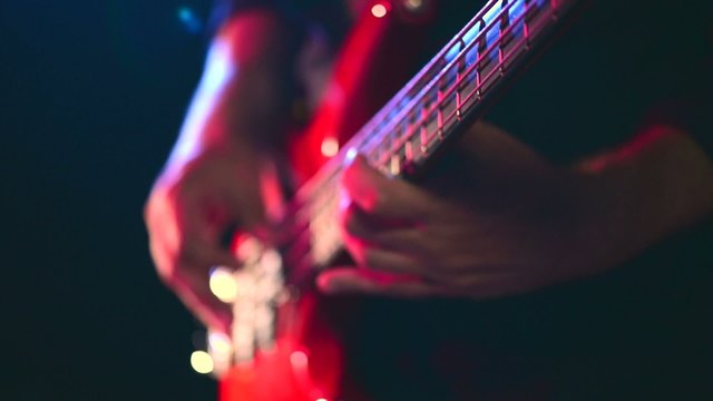 Man playing a bass guitar