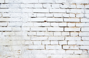 Old grunge brick white wall background