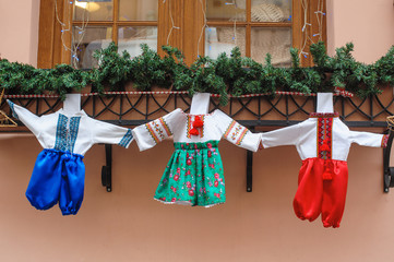 Multicolored Ukrainian costumes hanging from the balcony
