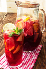 Refreshing sangria (punch) with fruits
