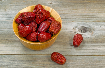 Dried date fruit in wooden bowl ready to eat